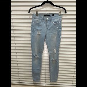 Light blue ripped jeans